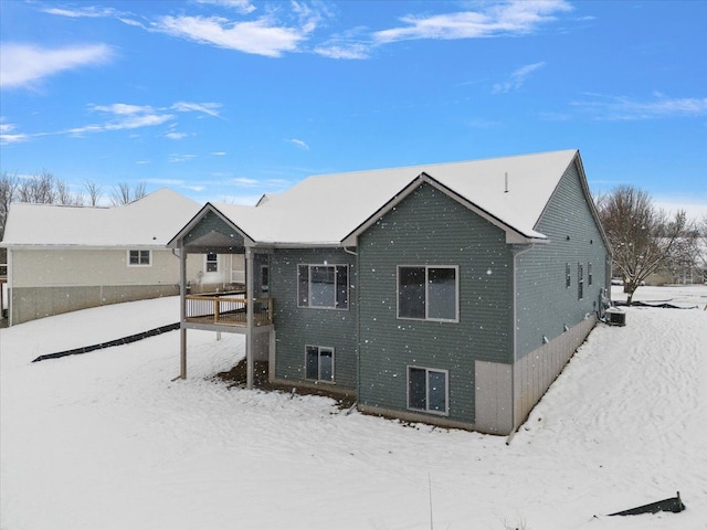 view of snow covered house