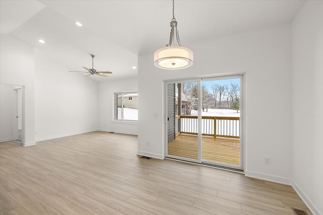 interior space with light hardwood / wood-style flooring and ceiling fan