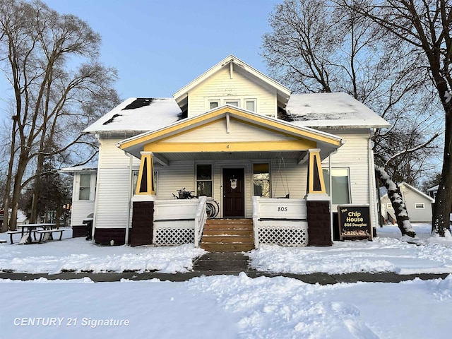 bungalow-style home featuring covered porch