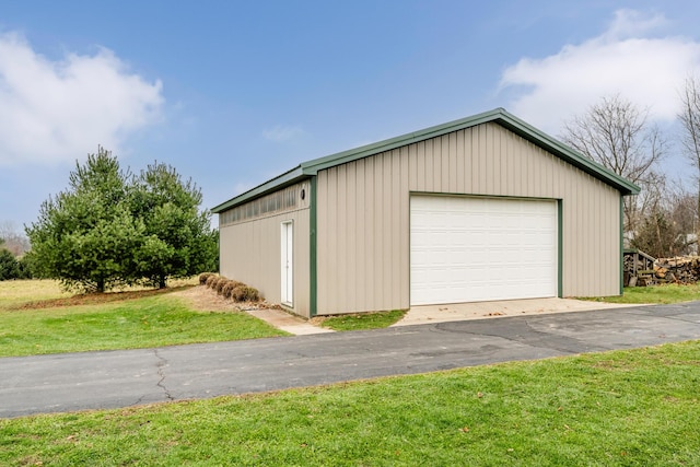 garage with a yard