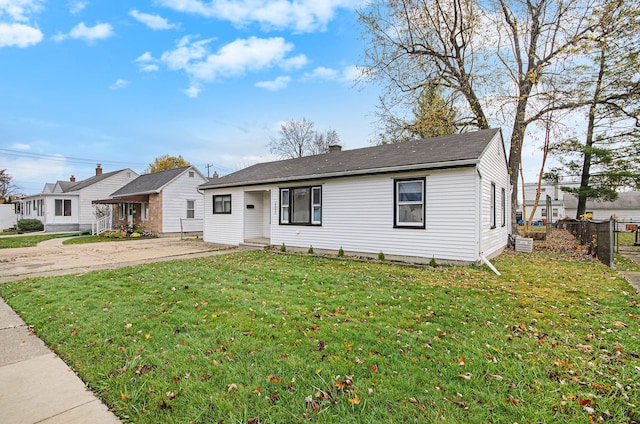 view of front of house with a front lawn