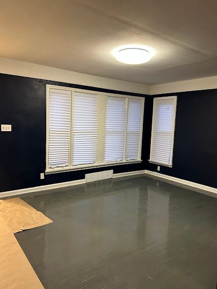 spare room with a textured ceiling