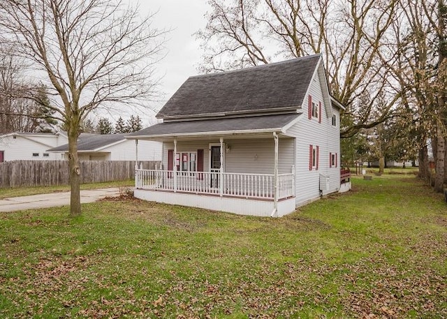 view of front of house featuring a porch and a front yard