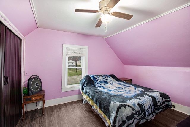 bedroom with hardwood / wood-style floors, ceiling fan, and lofted ceiling