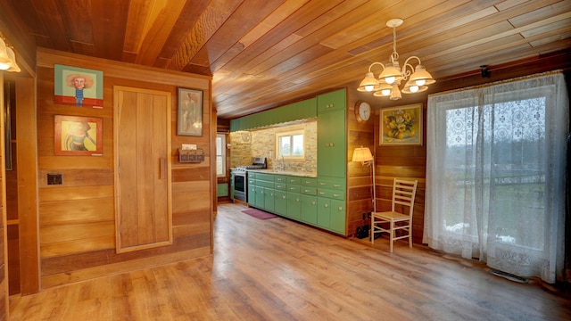 unfurnished dining area with wood walls, light hardwood / wood-style flooring, wooden ceiling, and a notable chandelier