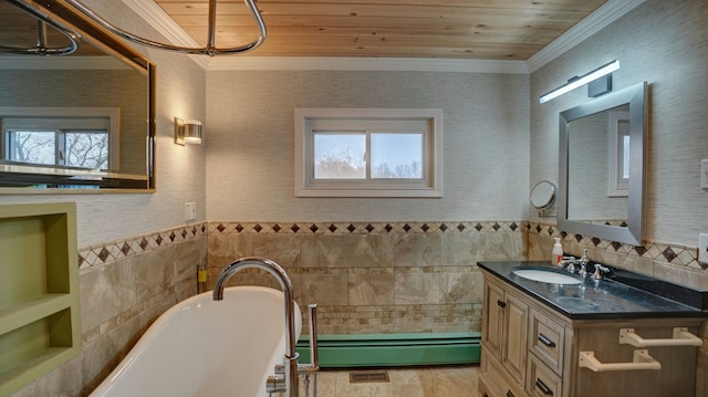 bathroom with wood ceiling, vanity, crown molding, a baseboard radiator, and a bathing tub