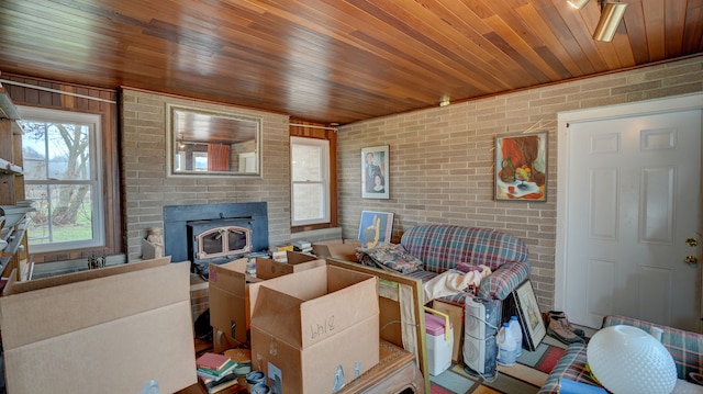 living room featuring brick wall