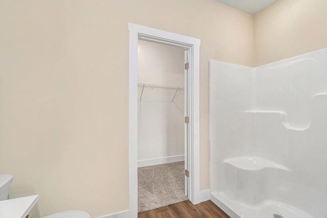 bathroom with vanity, hardwood / wood-style flooring, and toilet