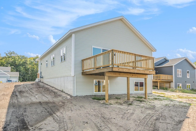 rear view of property with a deck