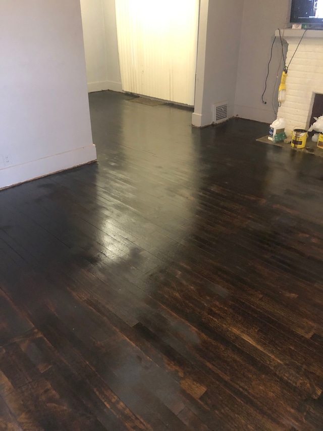 interior space with dark wood-type flooring