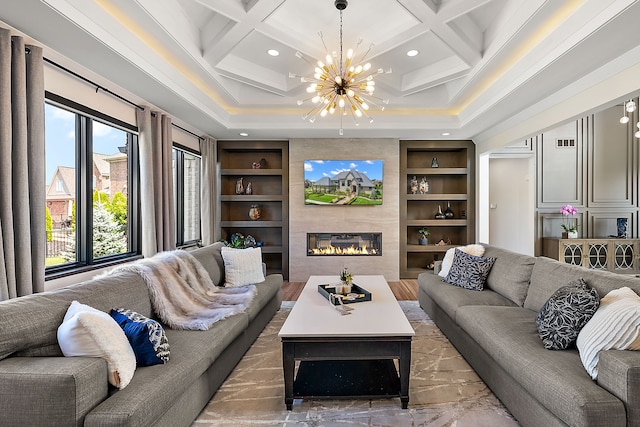 living room featuring built in shelves, a large fireplace, coffered ceiling, and beam ceiling