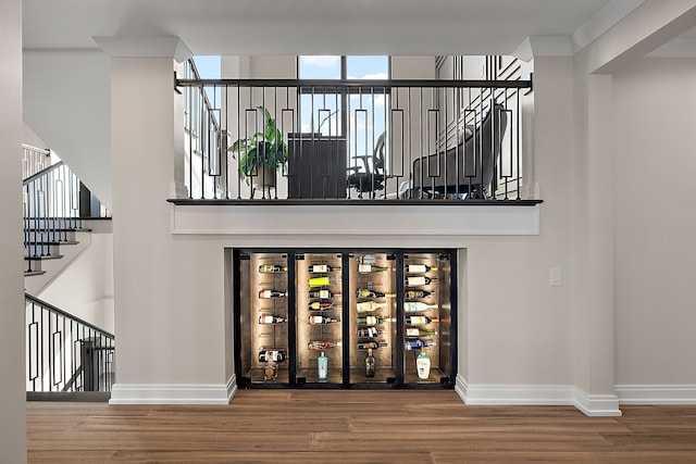 bar featuring wood-type flooring