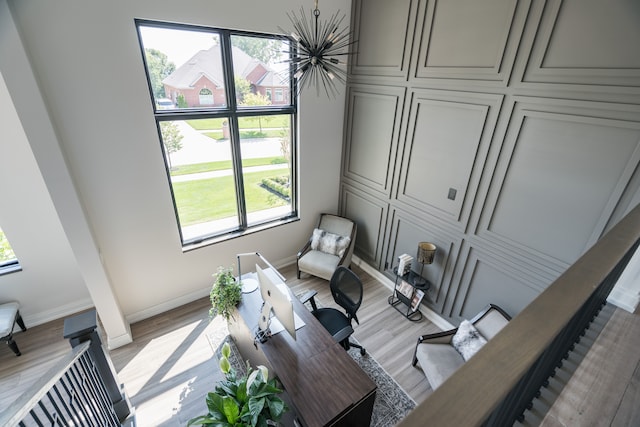 sitting room with light wood-type flooring