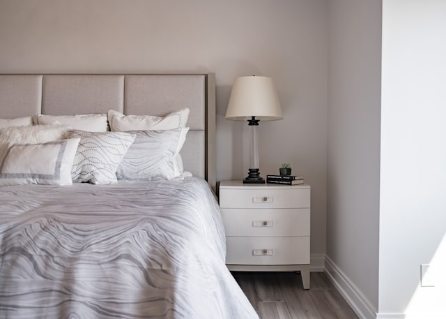 bedroom with dark wood-type flooring