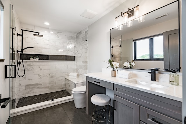 bathroom with vanity, toilet, and walk in shower