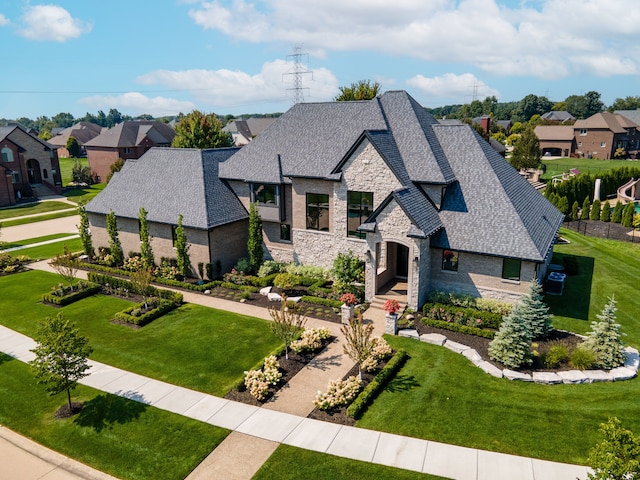 view of front of home featuring a front yard