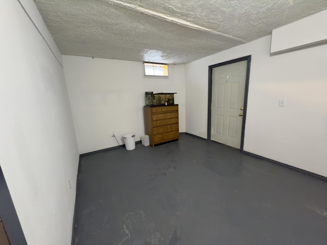 basement with a textured ceiling