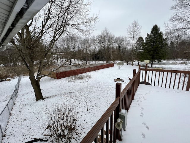 view of yard covered in snow