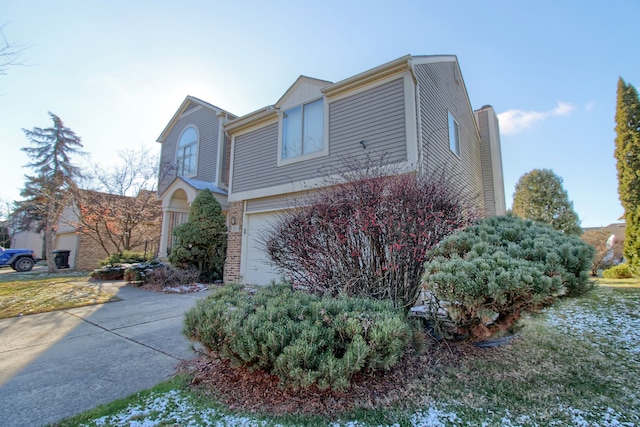 view of home's exterior with a garage