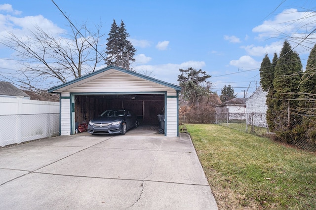 garage with a yard