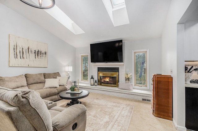 living room with a fireplace, light colored carpet, and vaulted ceiling