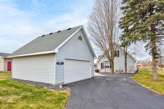 garage with a yard