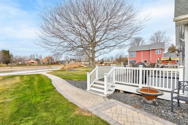 view of yard with a deck