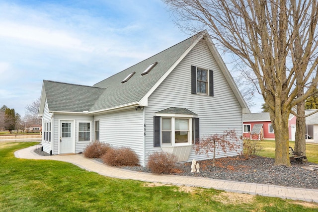 view of property exterior featuring a yard