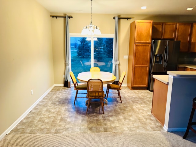 dining area with a chandelier