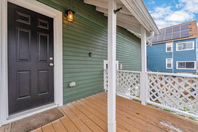 doorway to property with a deck