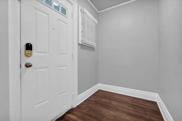 doorway featuring dark hardwood / wood-style floors and ornamental molding