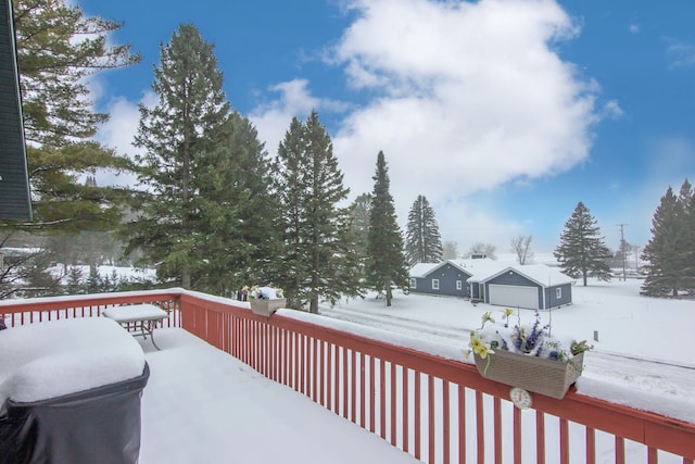 view of snow covered deck