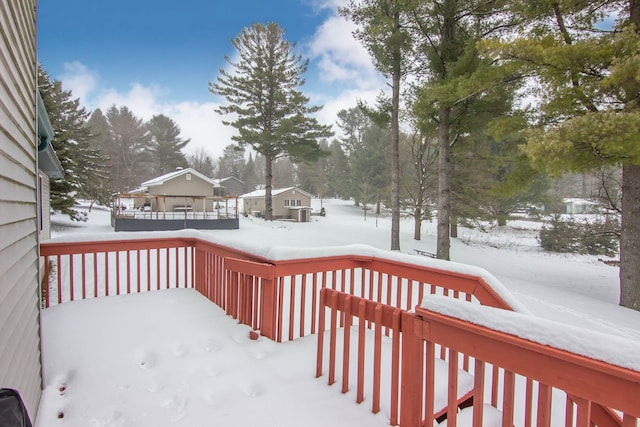 view of snow covered deck