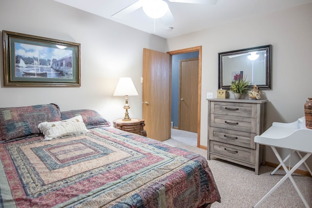 bedroom featuring ceiling fan and light colored carpet