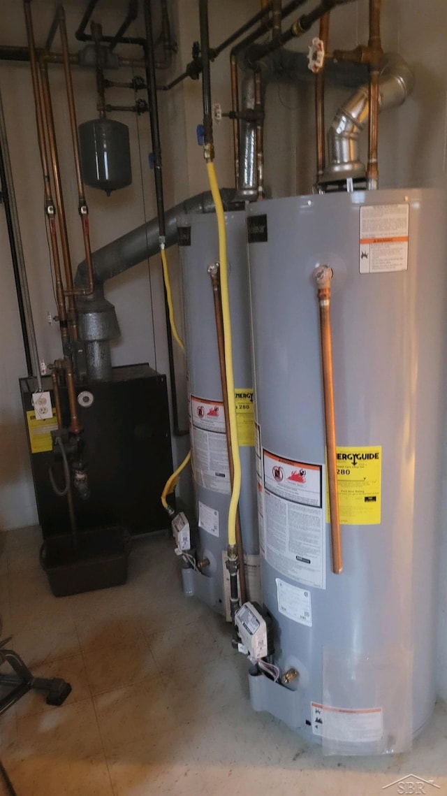 utility room featuring water heater