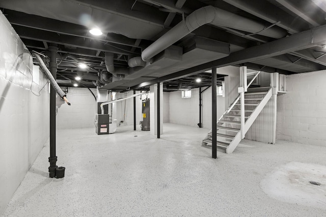 basement with heating unit and water heater