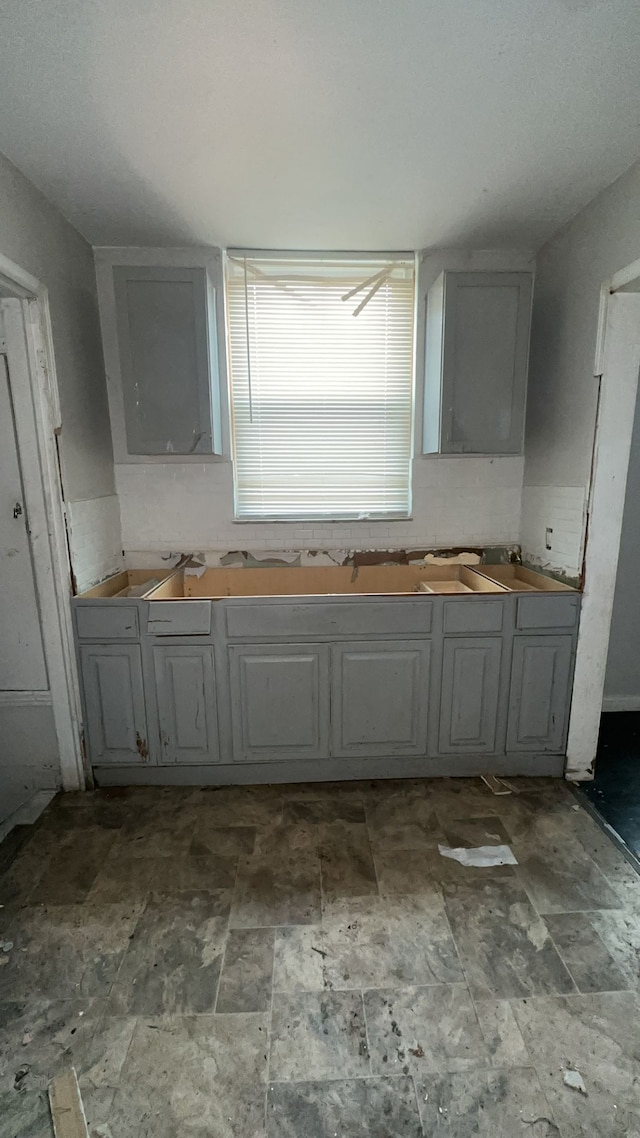 kitchen featuring gray cabinets