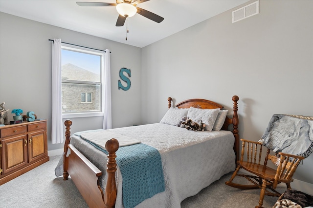 bedroom with light carpet and ceiling fan