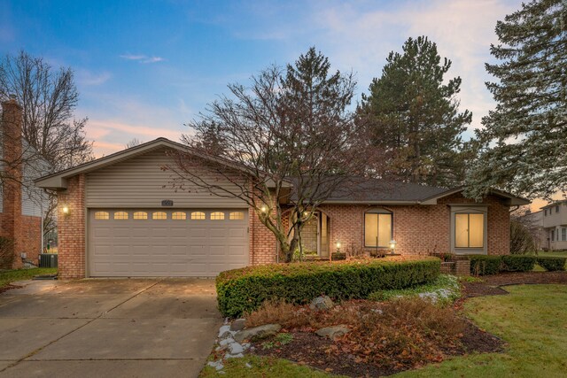 ranch-style house featuring a garage