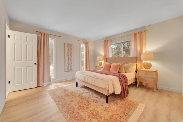 bedroom featuring light hardwood / wood-style flooring