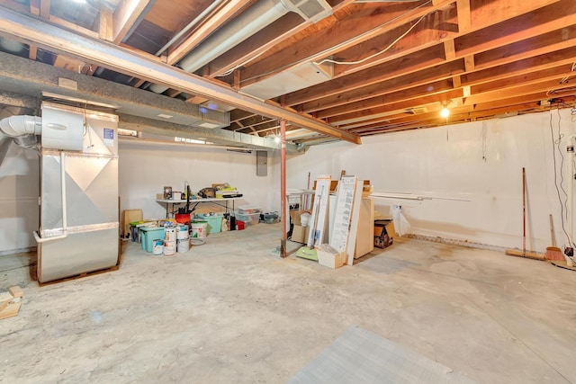 basement featuring heating unit