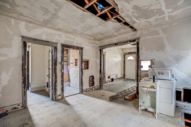 miscellaneous room featuring washer / dryer