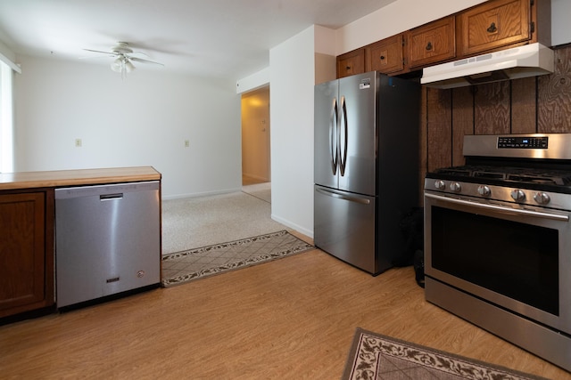 kitchen with ceiling fan and appliances with stainless steel finishes