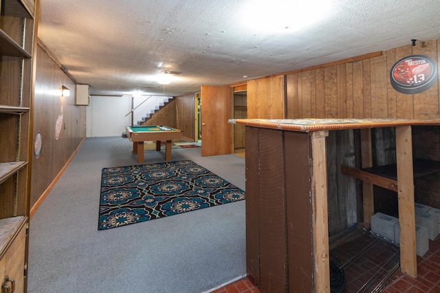 game room featuring light carpet, wooden walls, and billiards