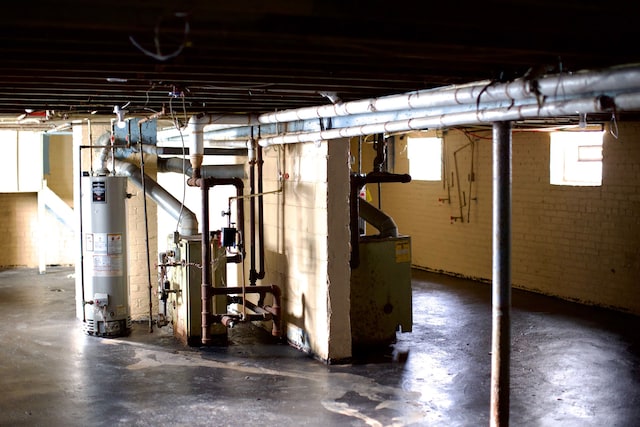 basement featuring gas water heater