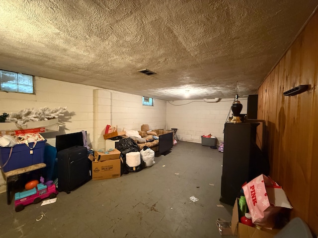 basement with a textured ceiling