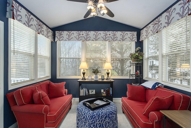 interior space with carpet, ceiling fan, and vaulted ceiling