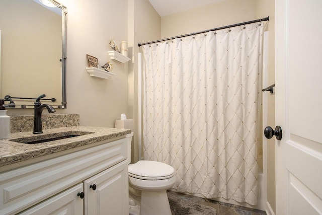 bathroom with a shower with curtain, vanity, and toilet