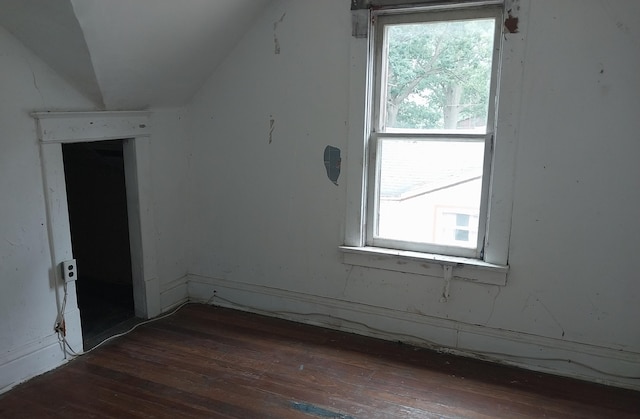 1872 Commerce St, Muskegon, MI 49441 - bonus room featuring hardwood / wood-style flooring and vaulted ceiling