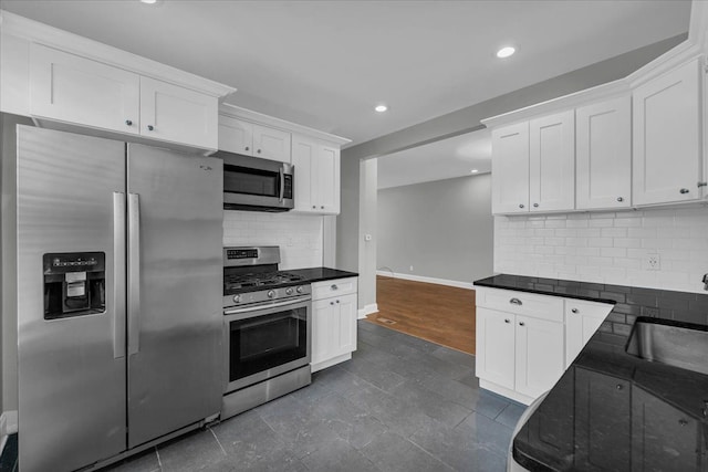 kitchen featuring sink, white cabinets, and stainless steel appliances